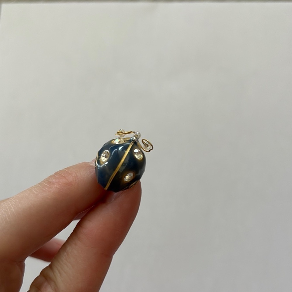 Blue and Gold Ladybug Brooch with intricate design and clear gemstone spots